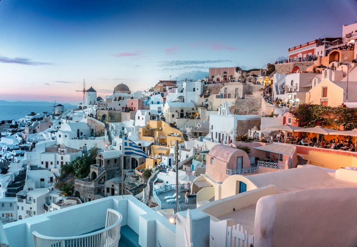 Cliffside hotels in Santorini at sunset